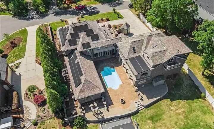 Castle CLT estate near Charlotte with pool and theater